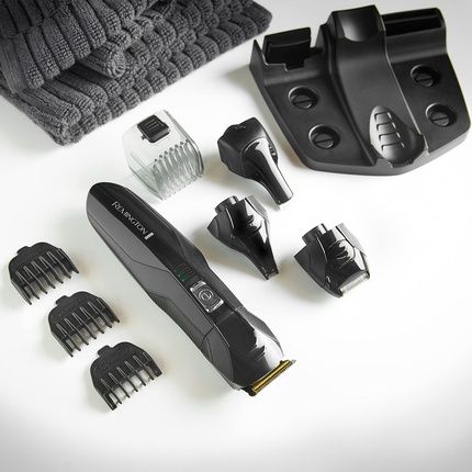 Remington All-In-One Grooming Kit Beard Trimmer Stainless Steel Blades 4 Attachments Hair Clipper Nose & Ear Trimmer Mini Foil Shaver 3 Combs 40-Minute Run Time Cordless Pg6020