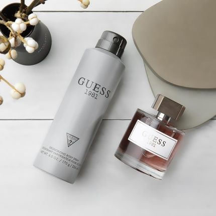 Guess 1981 Men Homme Eau De Toilette 3 Piece Gift Set - Cologne Spray 3.4 Fl. Oz., Deodorizing Body Spray 6.0 Oz., & Shower Gel 6.7 Fl. Oz.